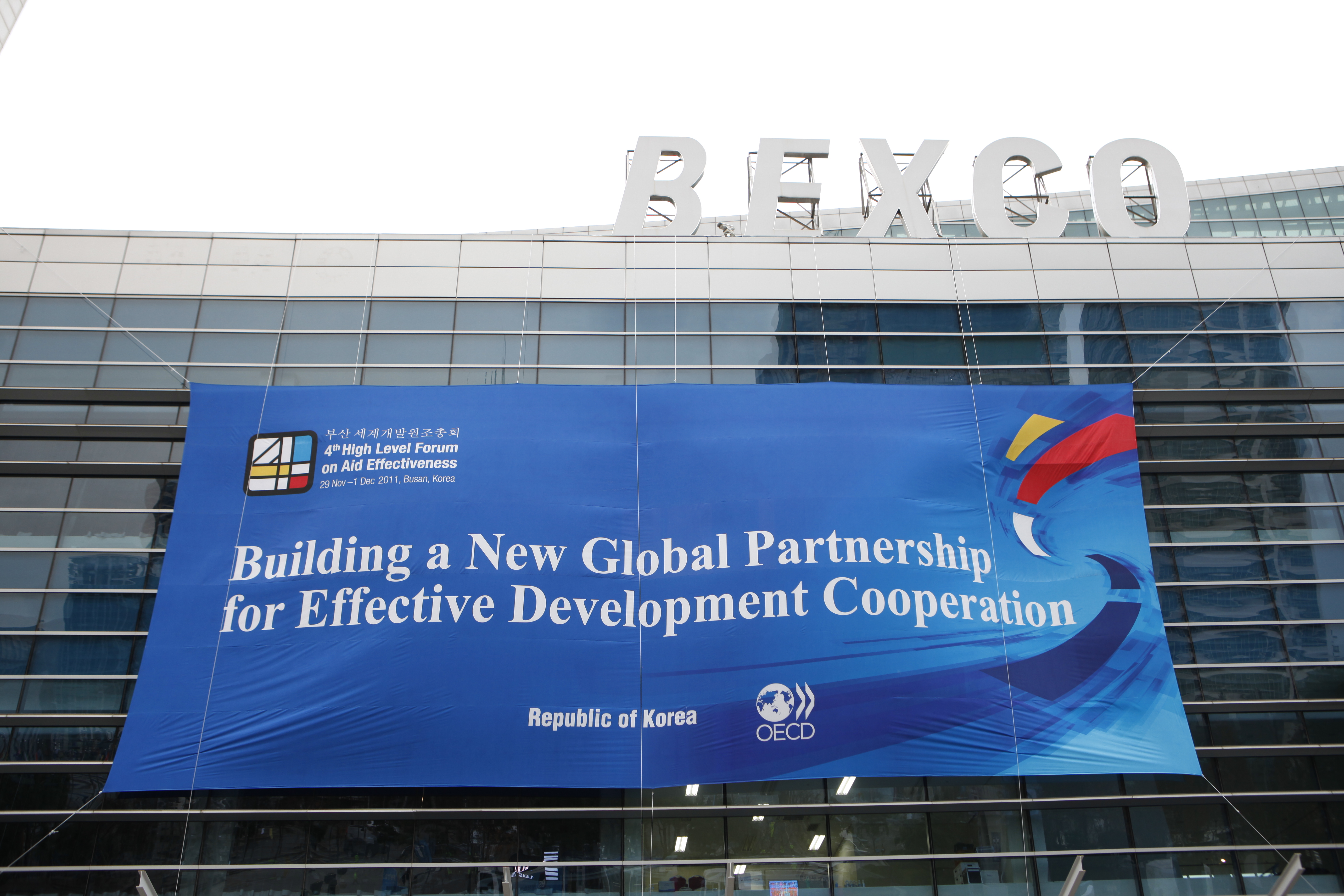 The logo of the High Level Forum, hanging on the side of the conference centre