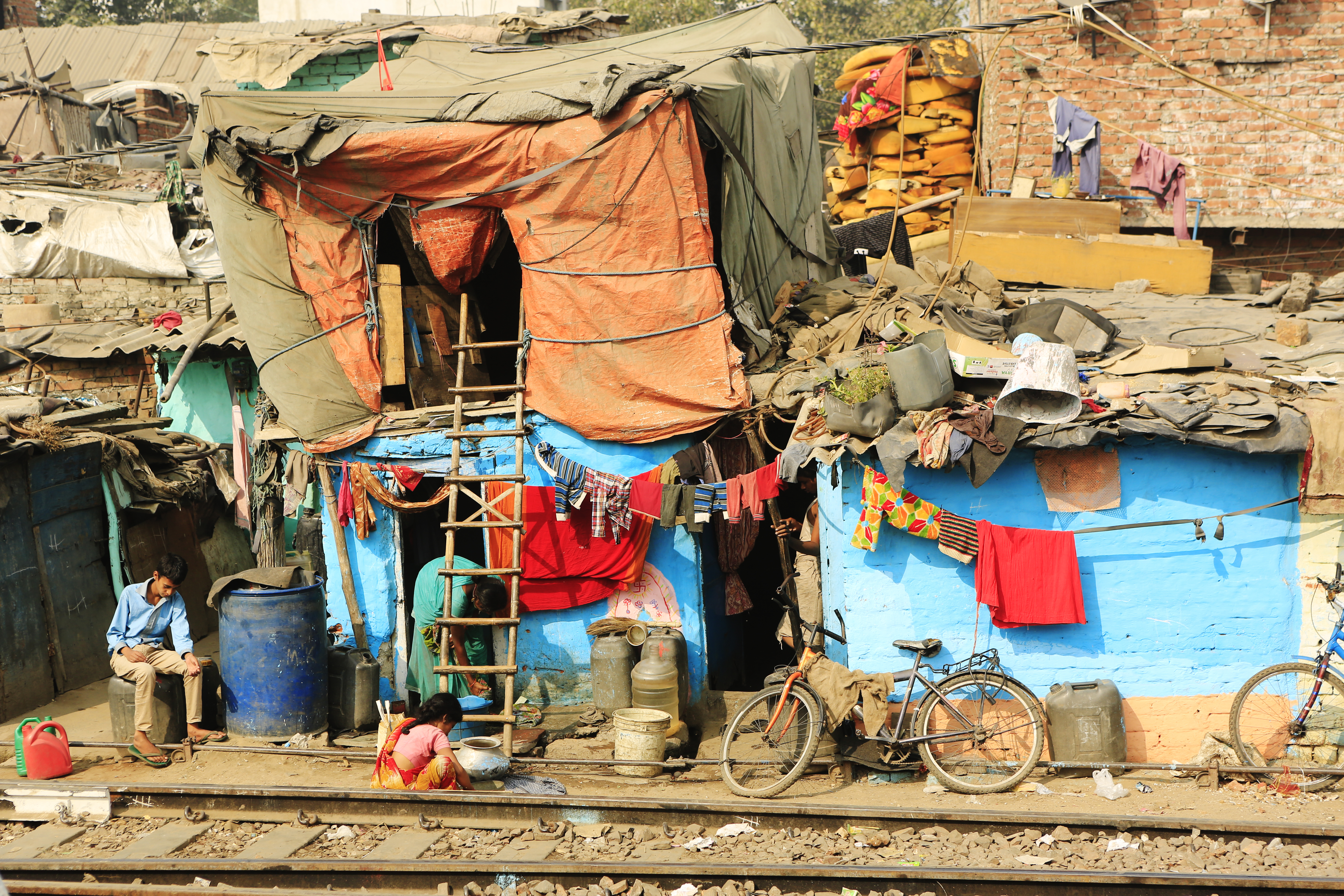 DELHI,INDIA - November 13,2014 : Ghetto and slums in Delhi India.These unidentified people live in avery difficult conditions on the ghettos of the city.